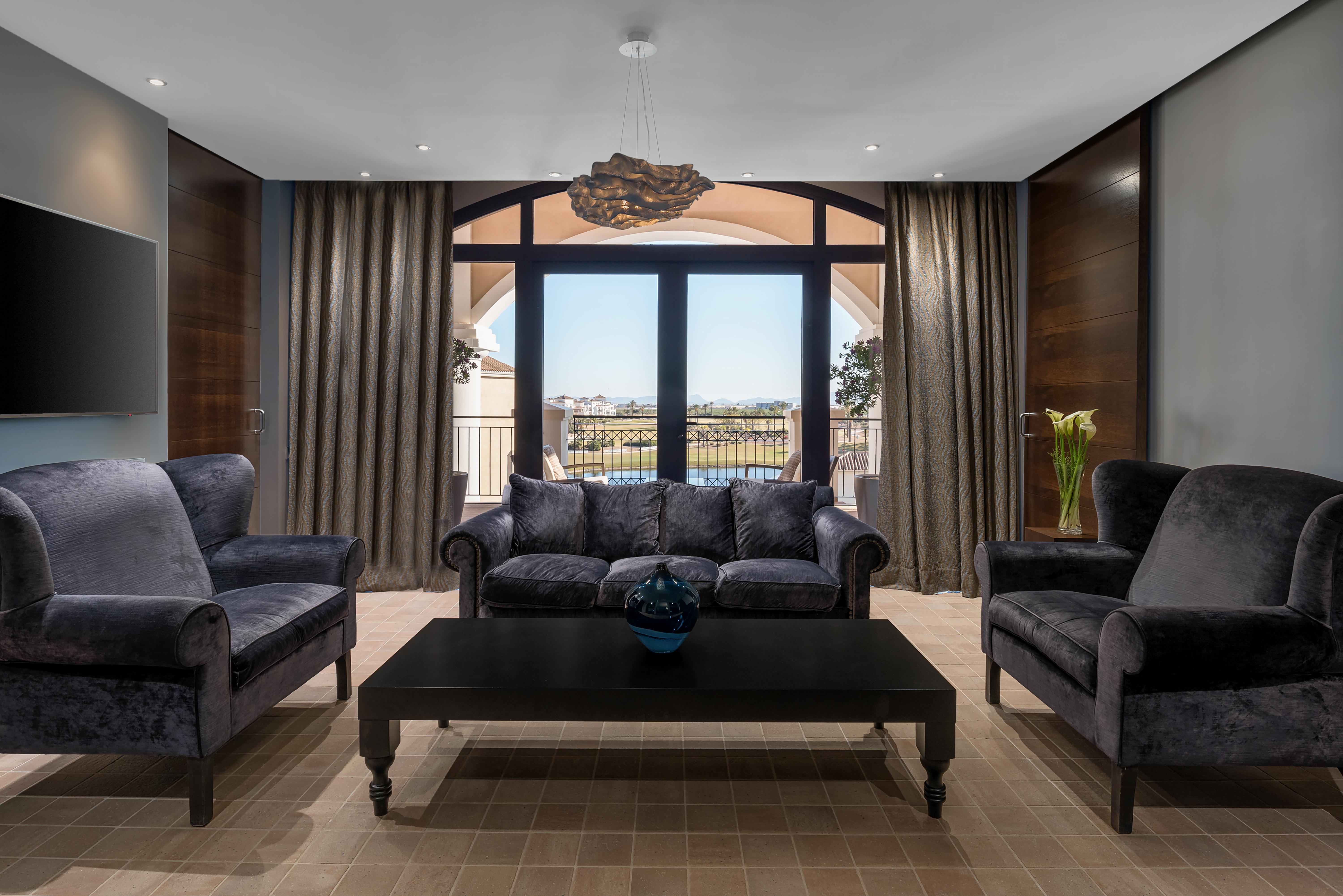 Doubletree By Hilton La Torre Golf Resort Roldan Bagian luar foto The interior of the hotel
