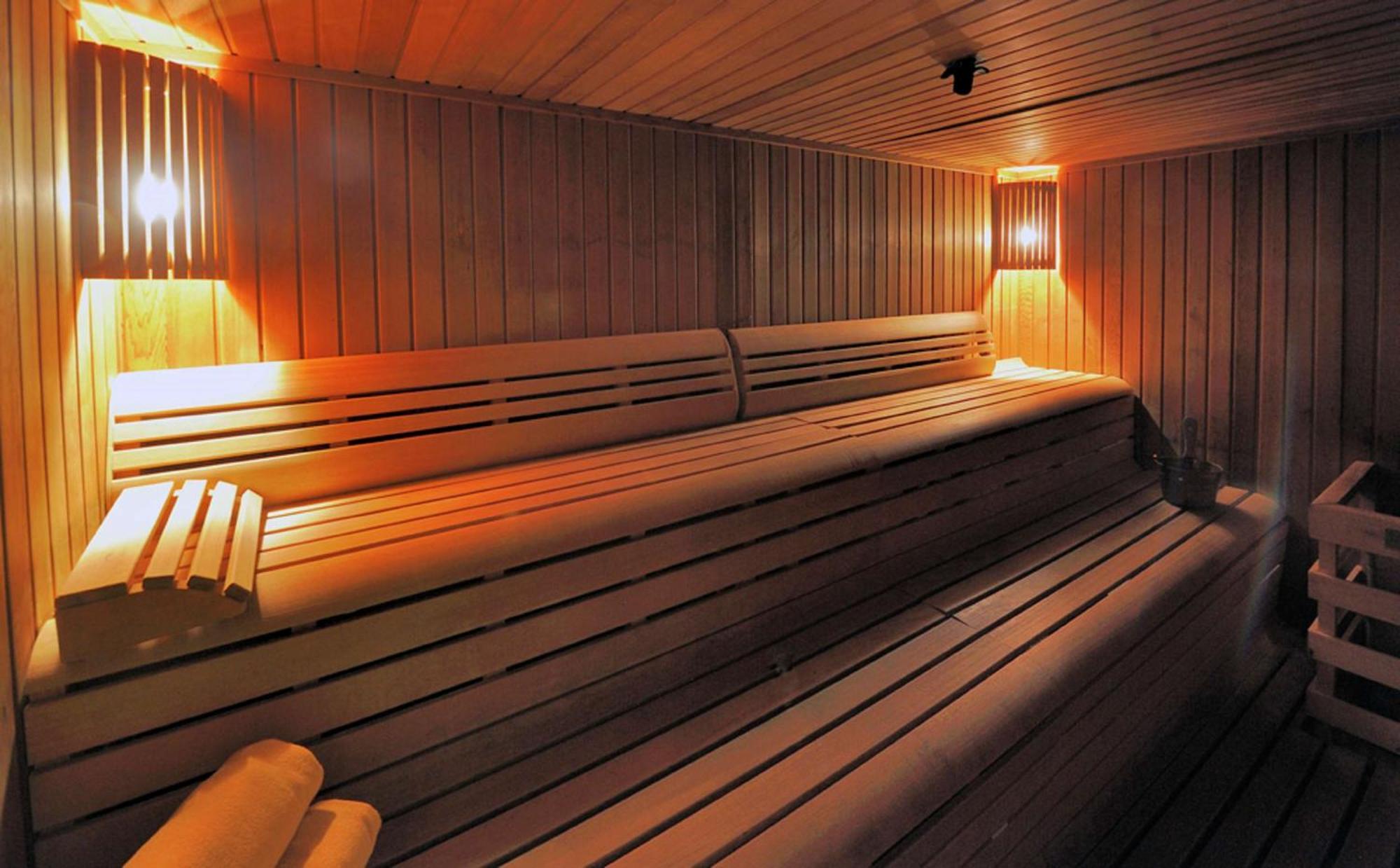 Doubletree By Hilton La Torre Golf Resort Roldan Bagian luar foto A modern Finnish sauna