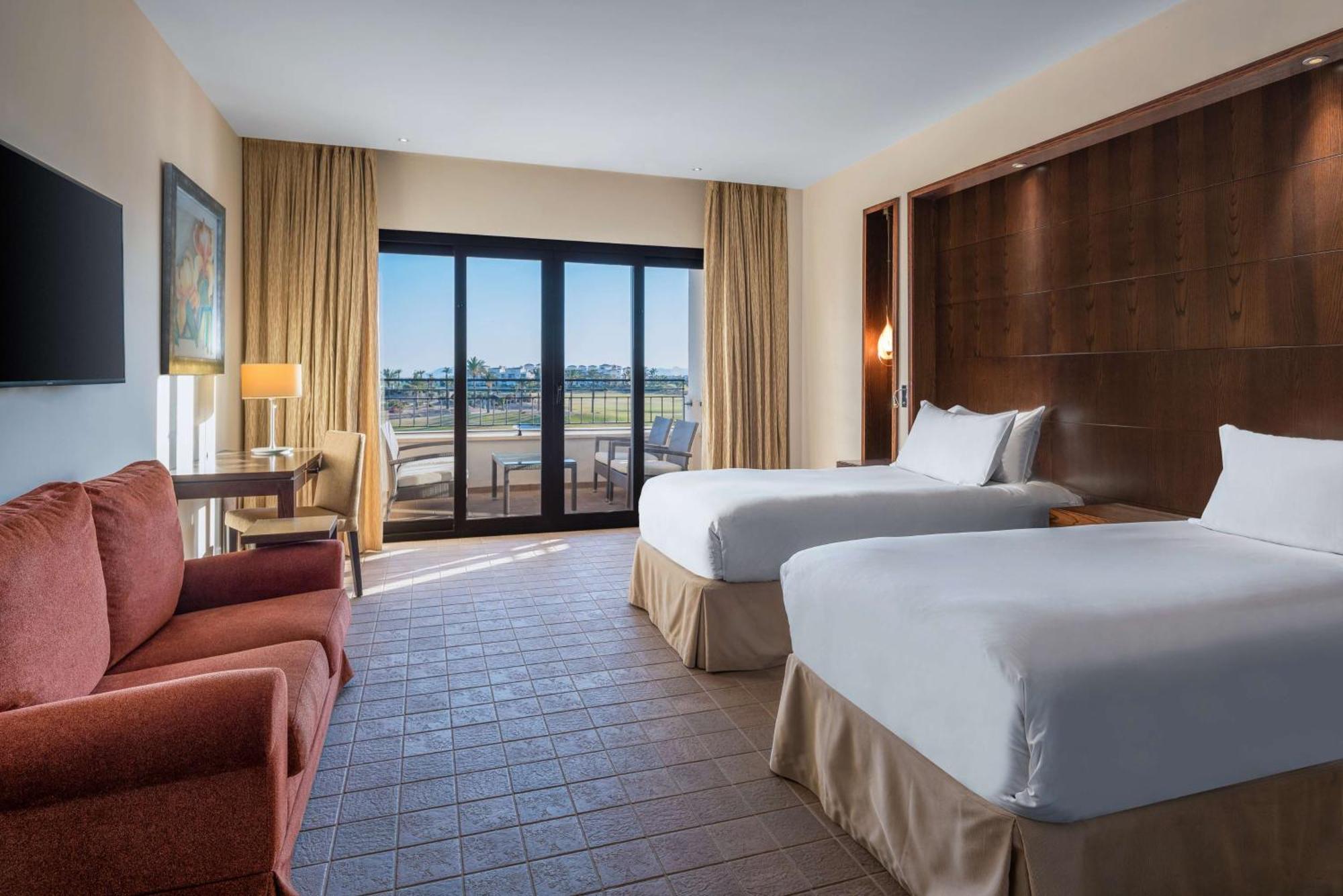 Doubletree By Hilton La Torre Golf Resort Roldan Bagian luar foto A guest room at the Hilton San Diego Bayfront