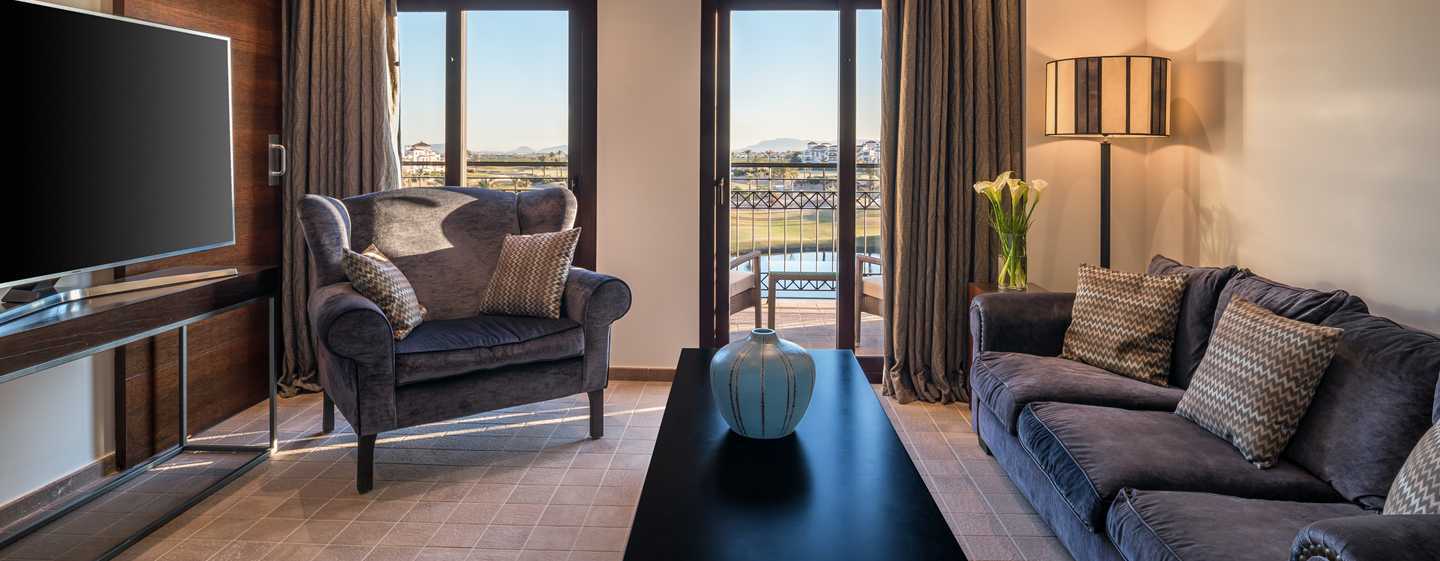 Doubletree By Hilton La Torre Golf Resort Roldan Bagian luar foto A suite at the hotel