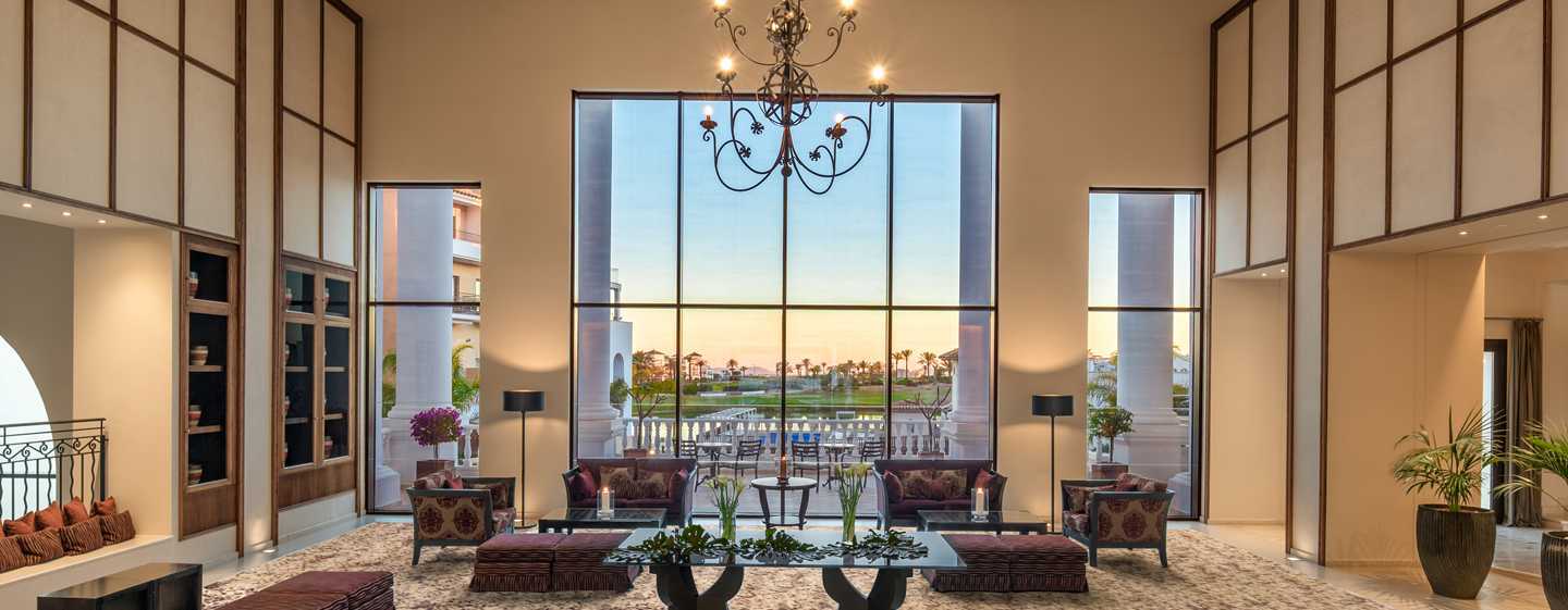 Doubletree By Hilton La Torre Golf Resort Roldan Bagian luar foto Lobby